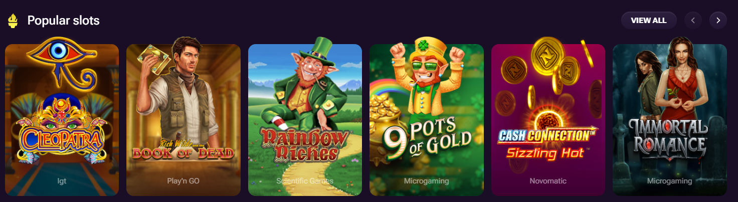 Popular slots section featuring Cleopatra, Book of Dead, Rainbow Riches, 9 Pots of Gold, Cash Connection Sizzling Hot, and Immortal Romance, with provider names shown below each game tile.